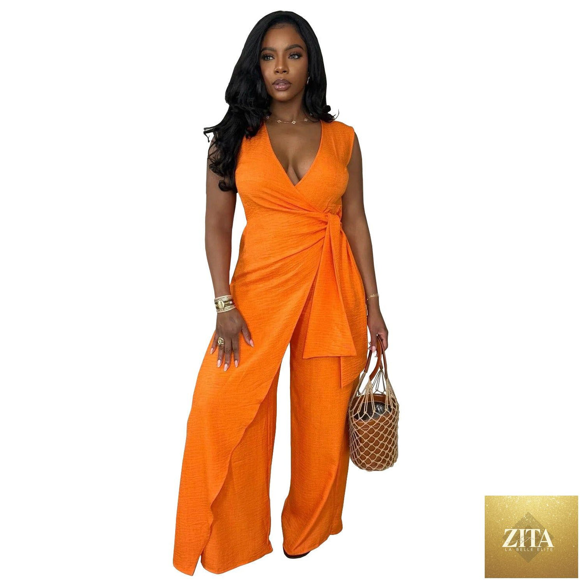 Women’s sleeveless V-neck cross straps wide-leg office jumpsuit by Bella Mia, featuring a split design and stylish fit.