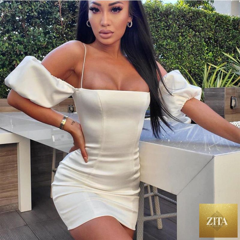 Women's satin sleeveless bodycon mini dress by SHOMICOBOUTIQUE featuring tube design, backless wrap style, perfect for cocktail parties.