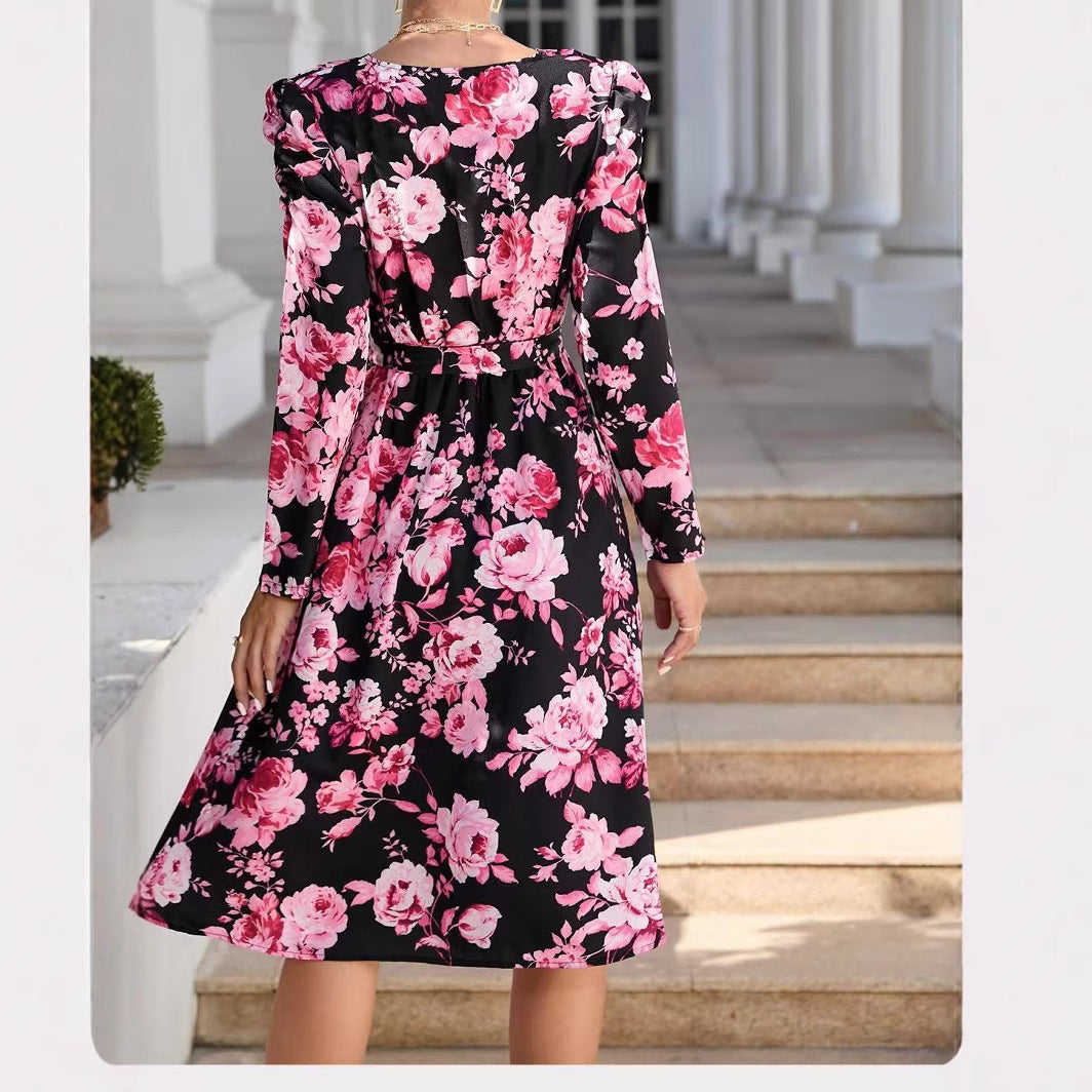 Printed V-neck long sleeve side-slit tie-front wrap maxi dress by SHOMICOBOUTIQUE, featuring a stylish and flowing design.
