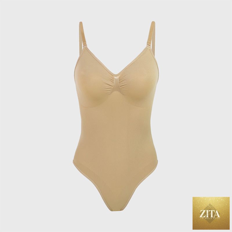 Deep V bodysuit by SHOMICOBOUTIQUE featuring push-up padding and tummy control, shown on a model in a fitted, trendy style.