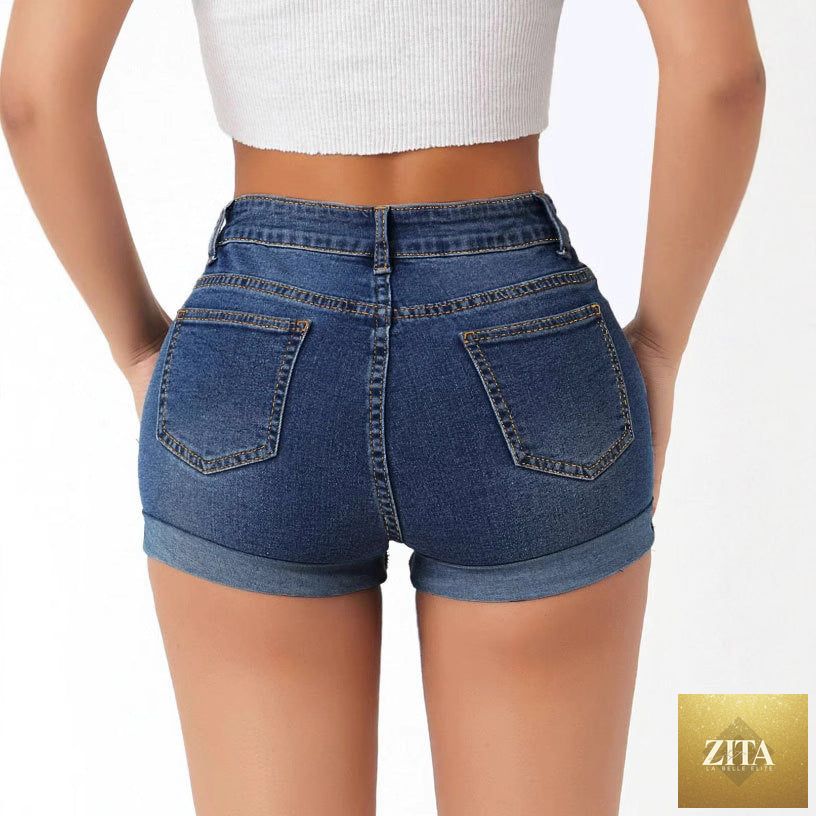 High waist elastic slim fit ripped jeans shorts for women, showcasing trendy distressed denim from Wanita Store.