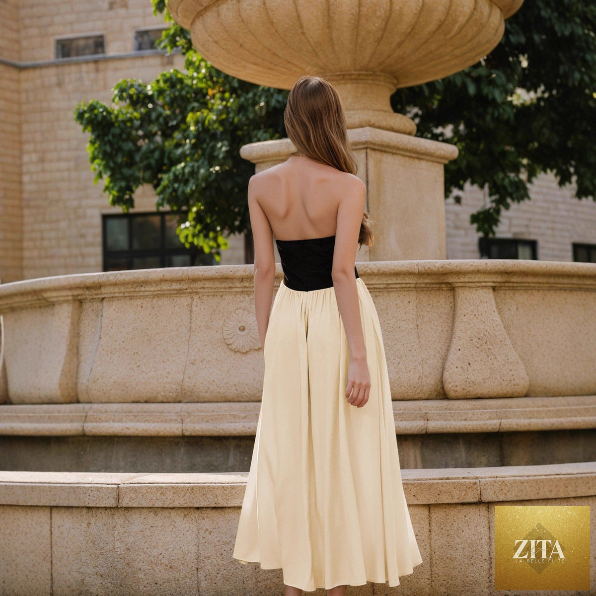 Bella Mia Socialite elegant women’s sleeveless backless maxi dress with black and white stitching, halter neckline, and slim fit design.