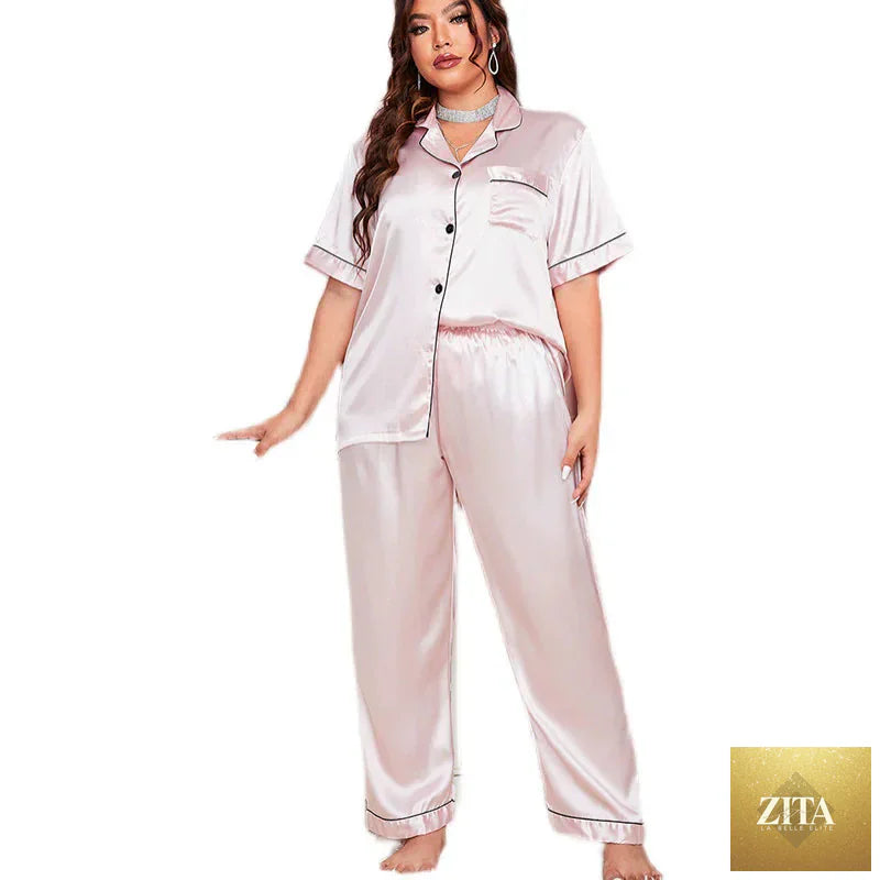 Plus size women’s silk pajama set by SMinvite, LLC featuring a comfortable, elegant pajama top and matching bottoms.