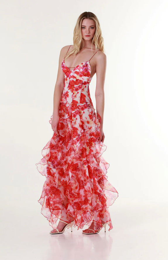 Elegant women's off-the-shoulder chiffon evening gown with floral print, long and flowing for formal occasions.