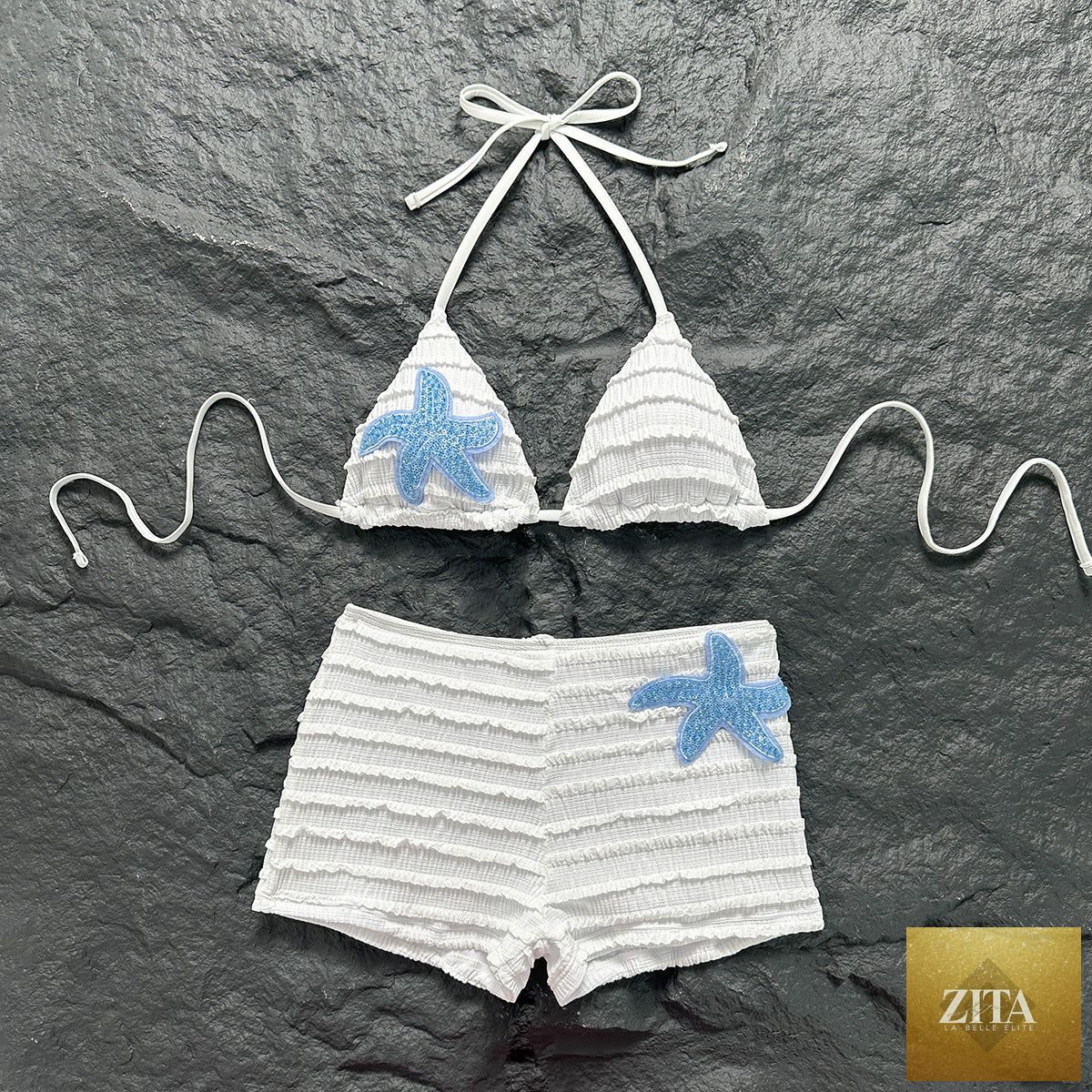 Bella Mia sexy beach vacation split boxers bikini swimsuit showing a stylish swimwear design with bold patterns and a flattering fit.