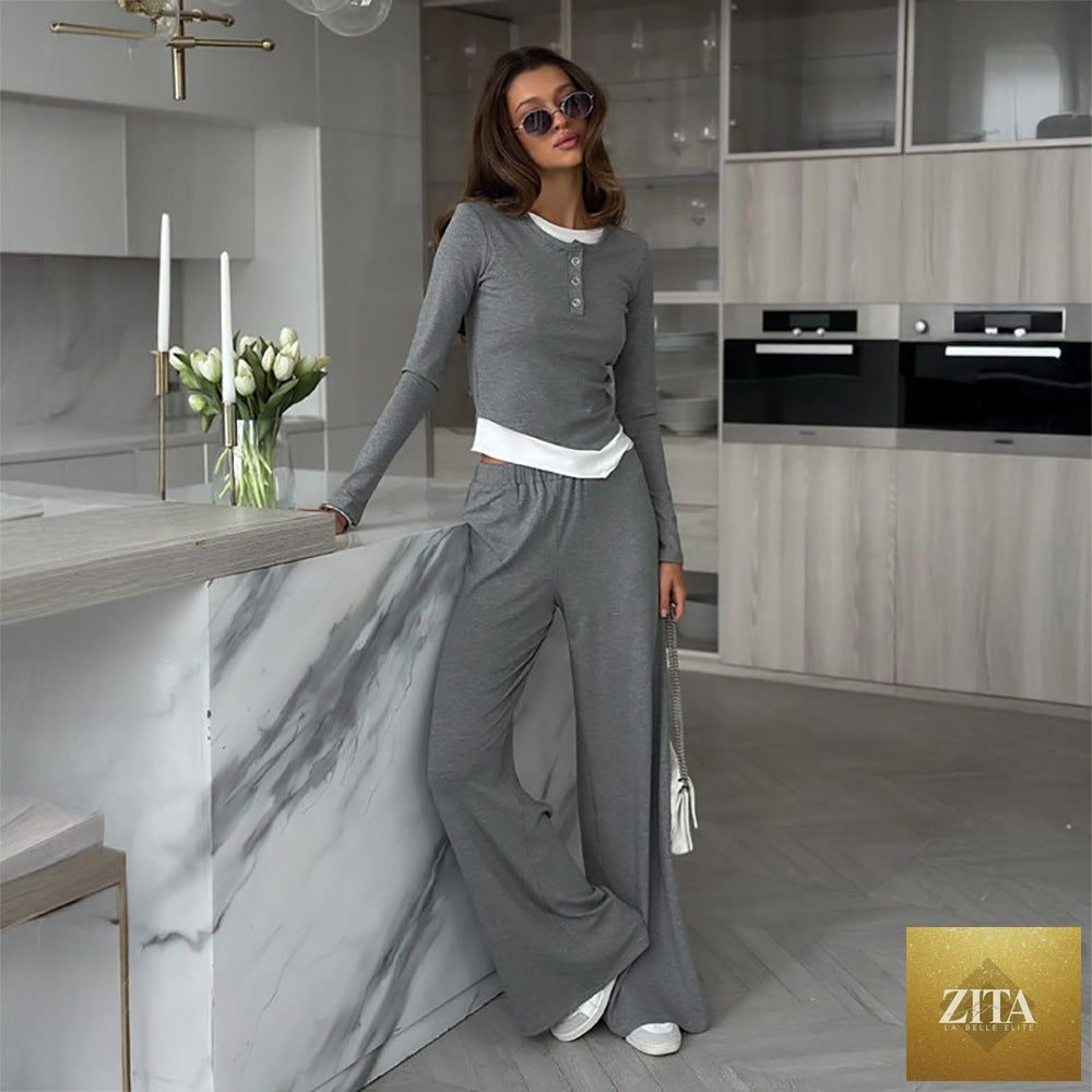 Casual women's autumn faux two-piece set with T-shirt top and trousers from Wanita Store, perfect for relaxed daily wear.