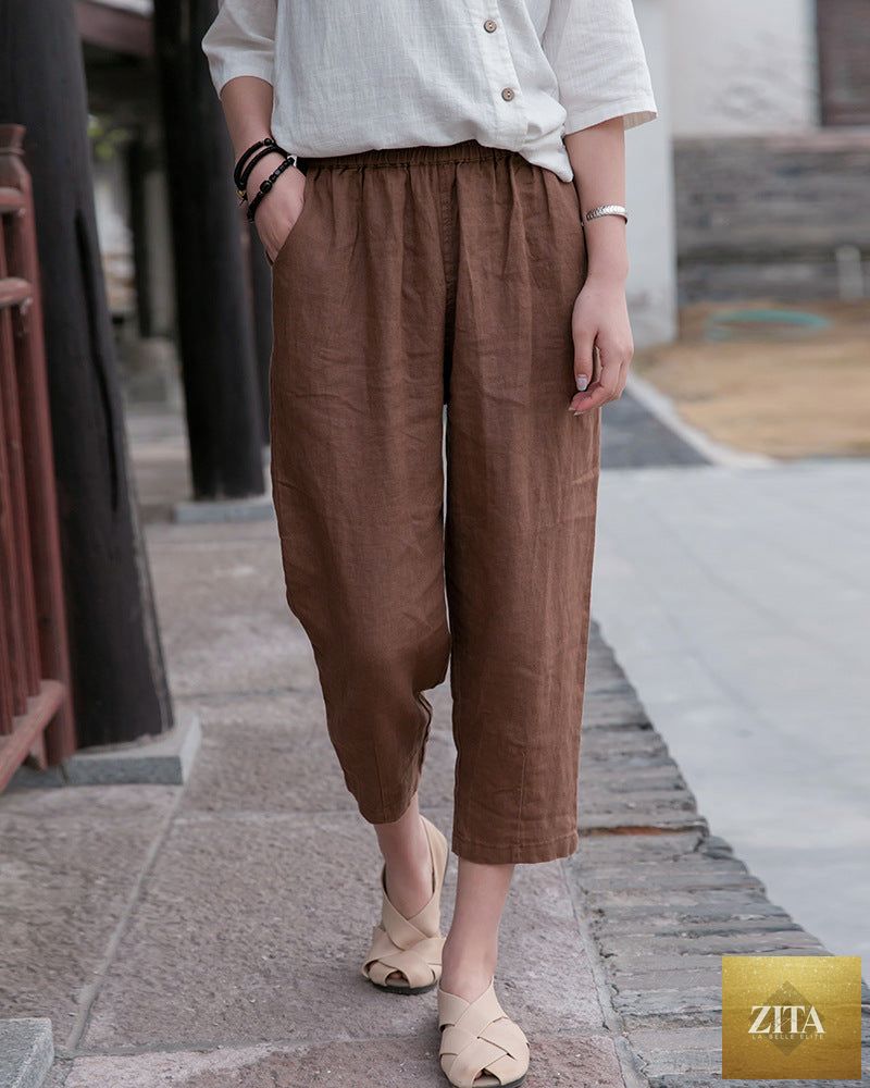 Casual cotton linen slim-fitting cropped pants for women, featuring a baggy style in natural fabric, perfect for spring and summer wear.
