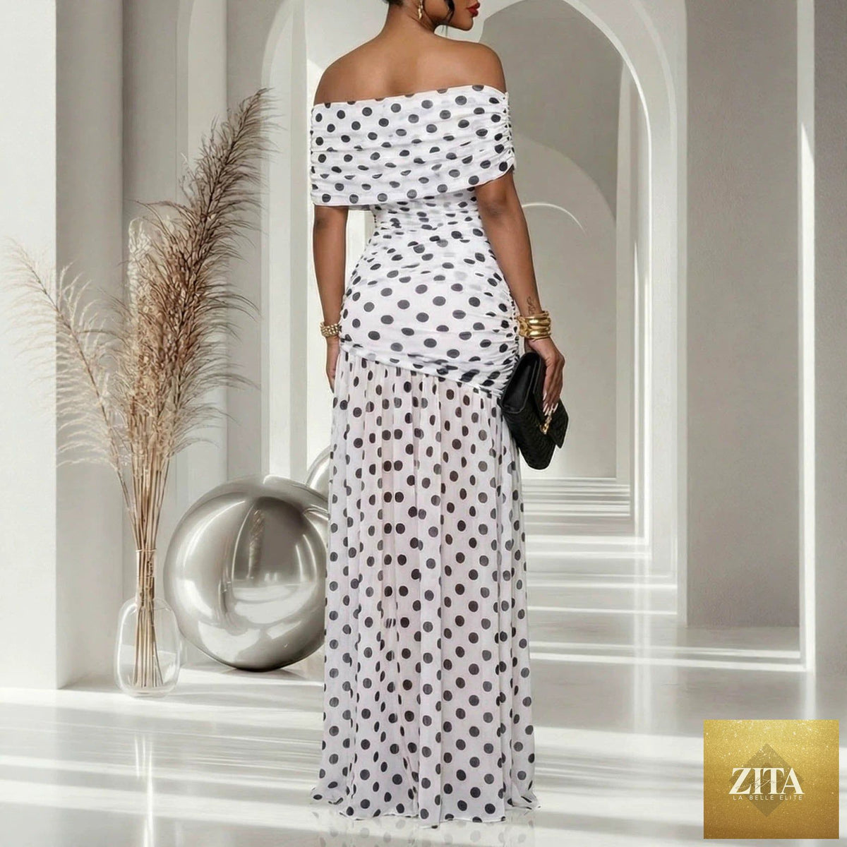 Women’s Bella Mia polka dot split patchwork cold shoulder cocktail dress displayed on a hanger with a close-up of the fabric.