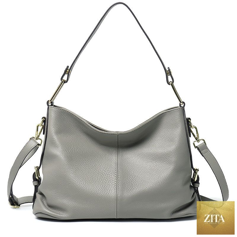 Elegant genuine leather handbag with stylish hobo and crossbody tote design, featuring sleek craftsmanship and versatile wear.