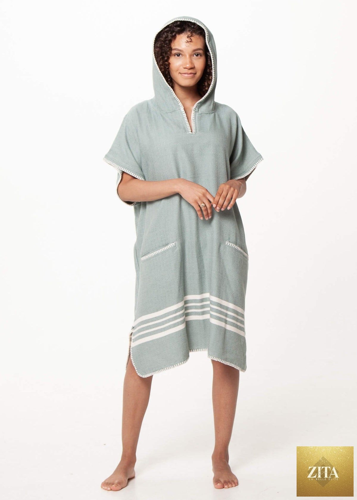 Almond green Zita La Belle Elite beach cover-up poncho with hood, lightweight and stylish for seaside comfort and sun protection.