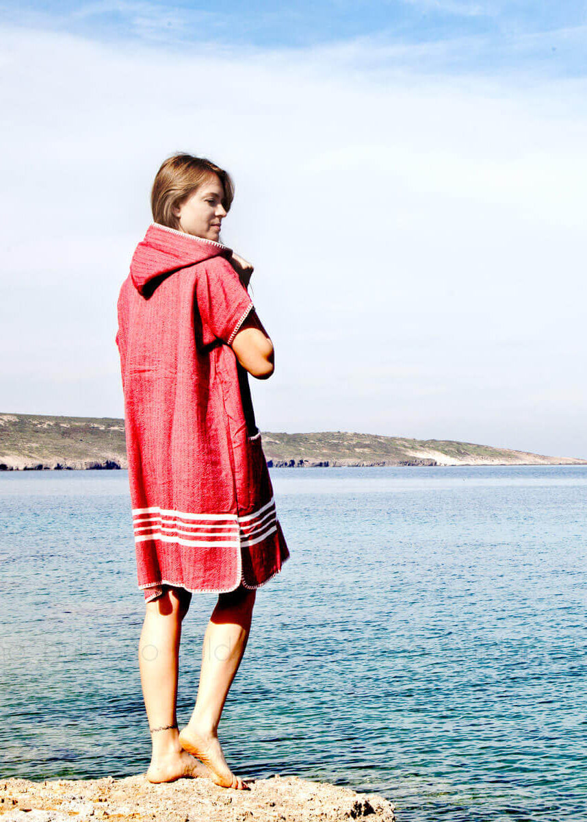 Buldano beach cover-up poncho with hood, lightweight and breathable, perfect for seaside or poolside wear.