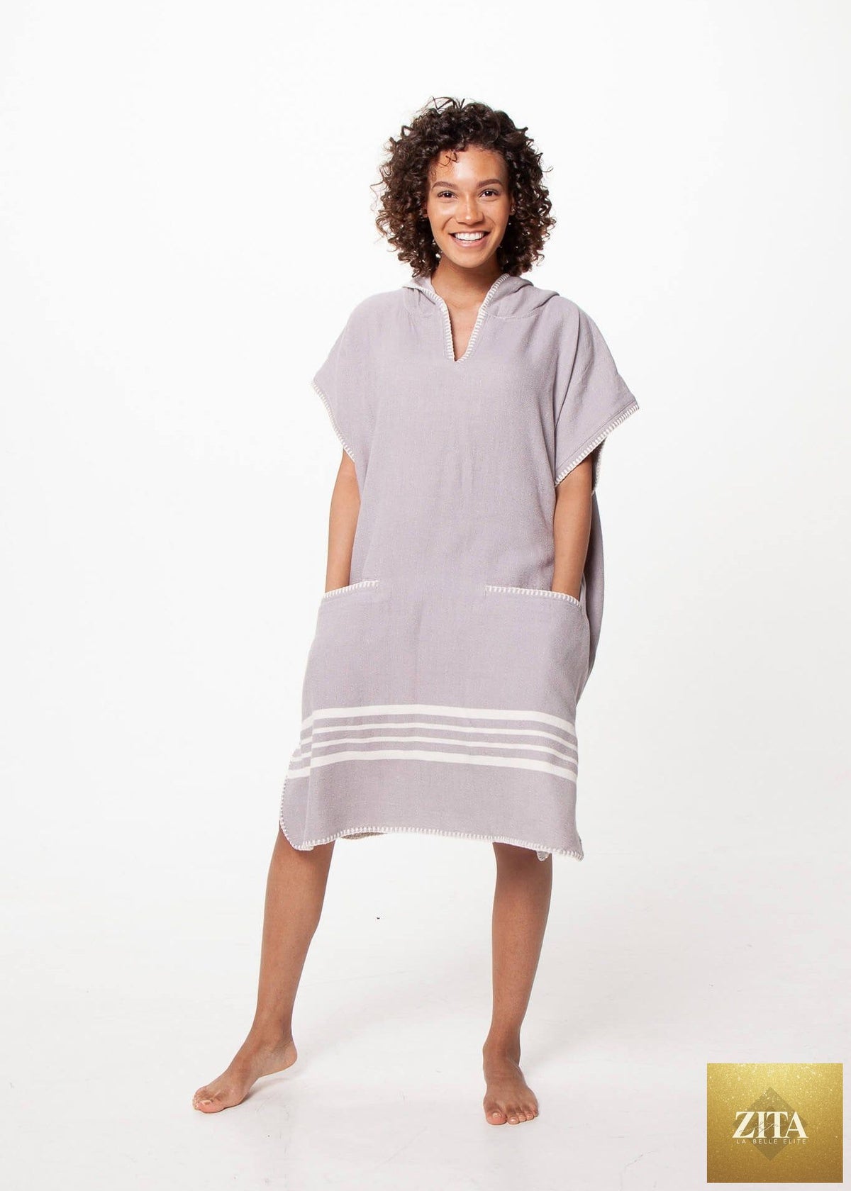 Gray Zita La Belle Elite beach cover-up poncho with hood, showcasing a relaxed fit and lightweight fabric for beachwear.