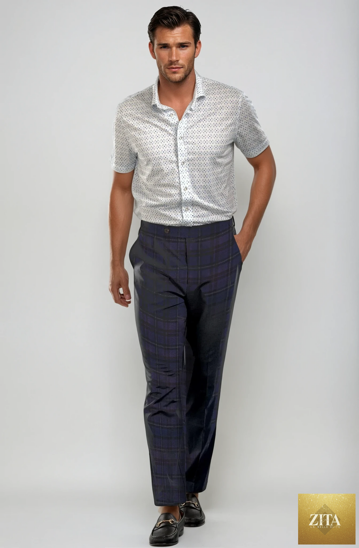 Navy plaid pleated wool trouser pants by Buki, featuring a tailored fit and classic pattern, displayed flat on a white background.