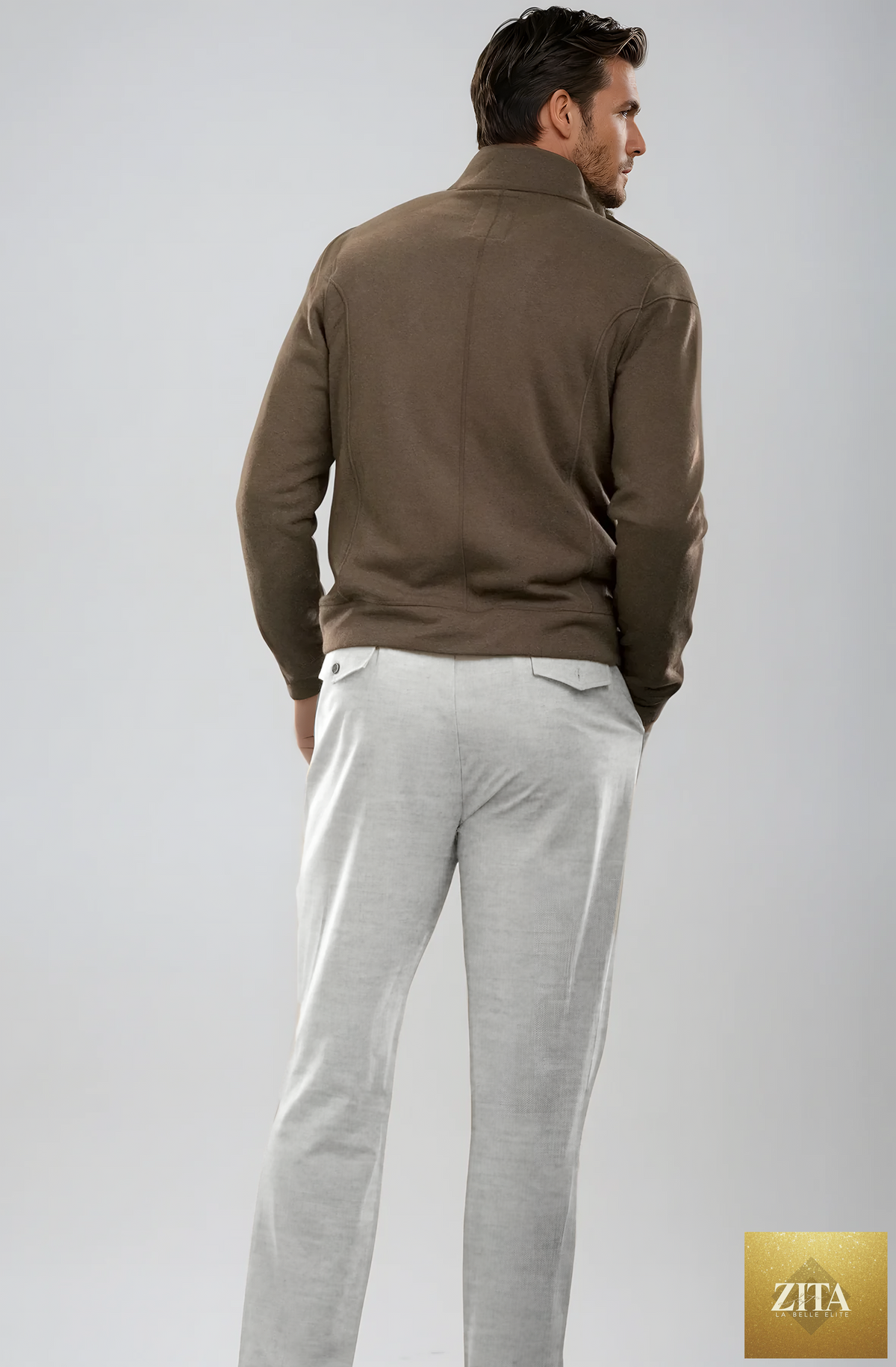 Back view of Buki pleated wool trouser pants in Heather Grey, showcasing the tailored fit and pleated design for a sophisticated look.