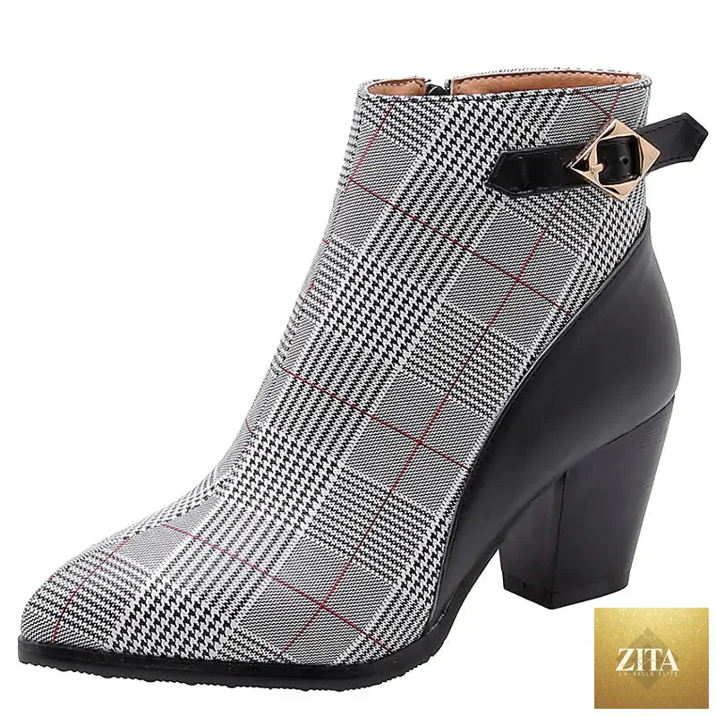 Women's high heel short boots with thick heels, stylish black ankle boots from Trendy Attic Store01, showing side view and textured material.