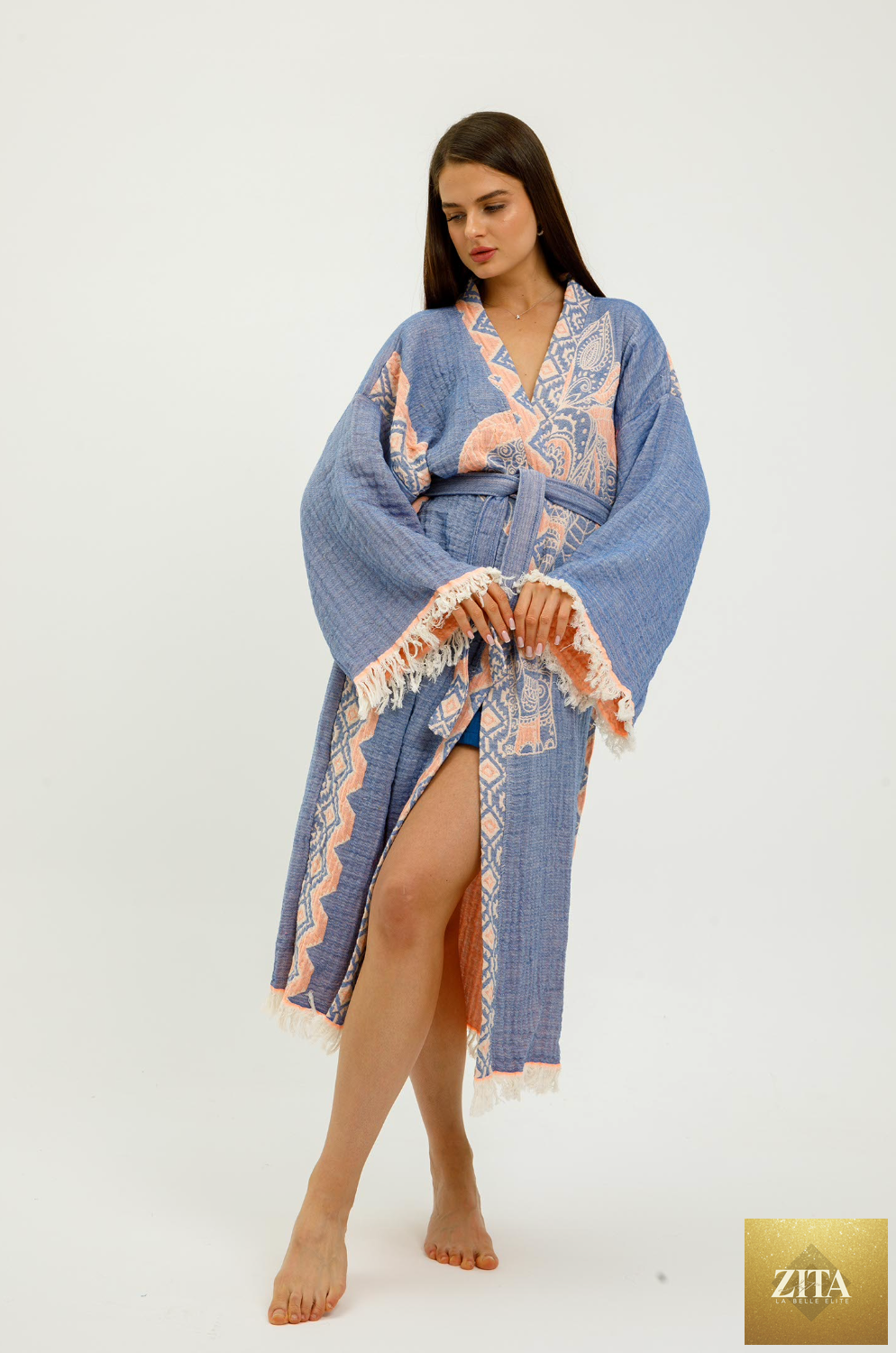 Blue jungle-themed kimono featuring elephant print by buldano, displayed flat with intricate fabric details.