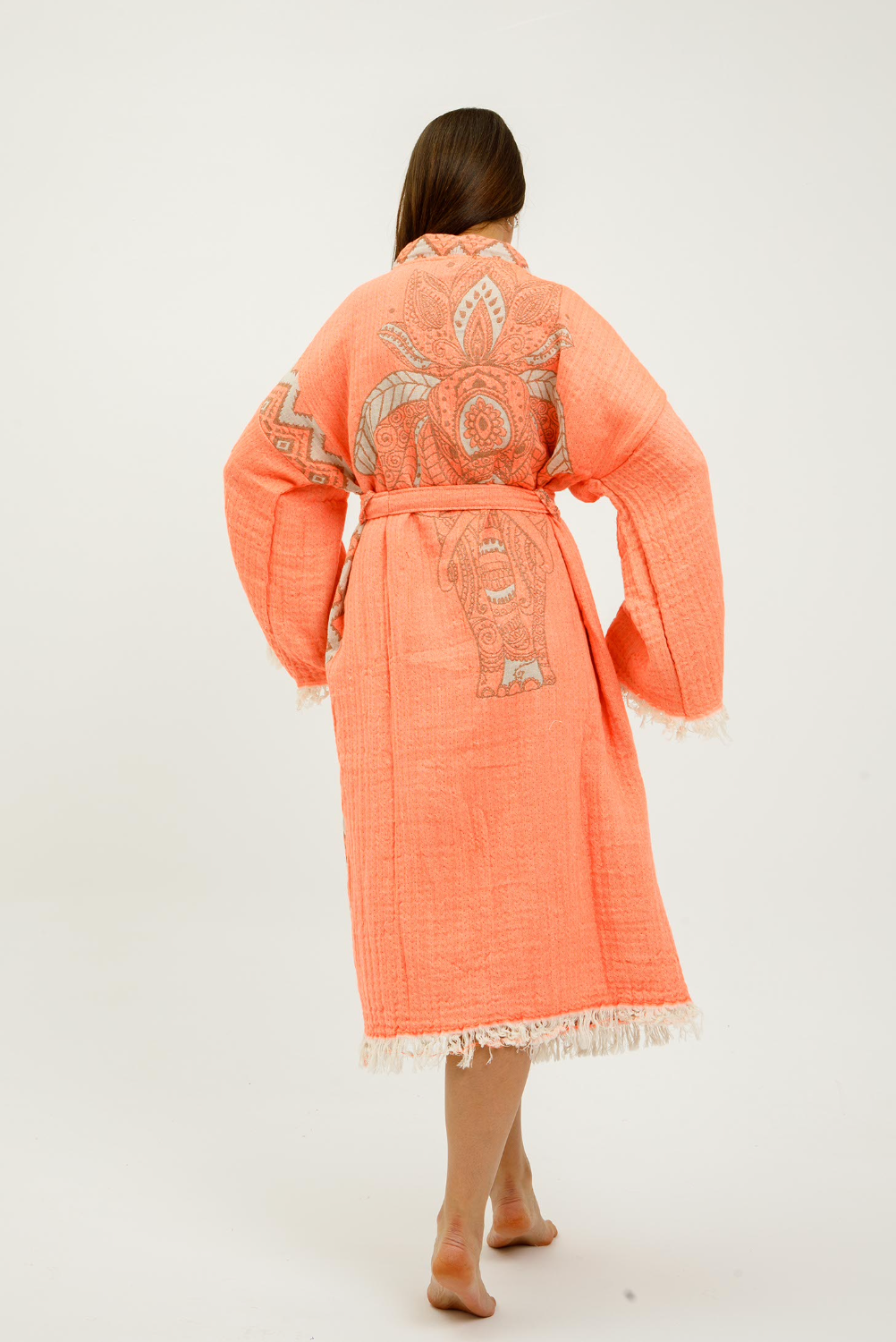 Buldano Jungle Kimono featuring an elephant design, lightweight fabric, and vibrant jungle print for a stylish, comfortable look.