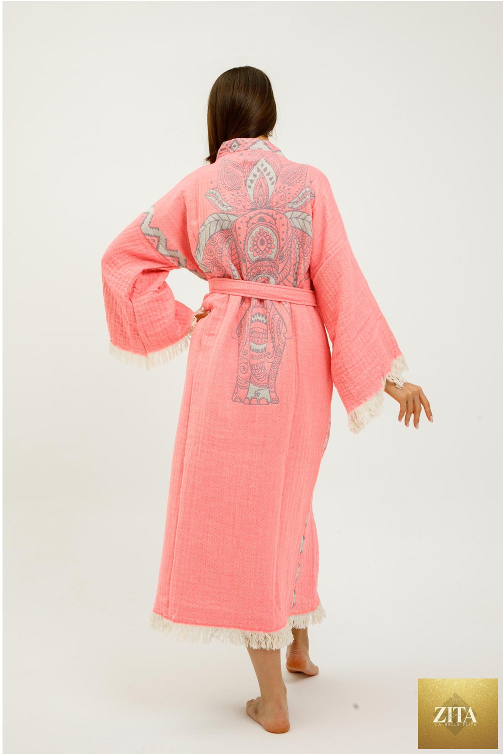Pink jungle-themed kimono by Zita La Belle Elite featuring elephant print and lightweight, flowing fabric for stylish comfort.