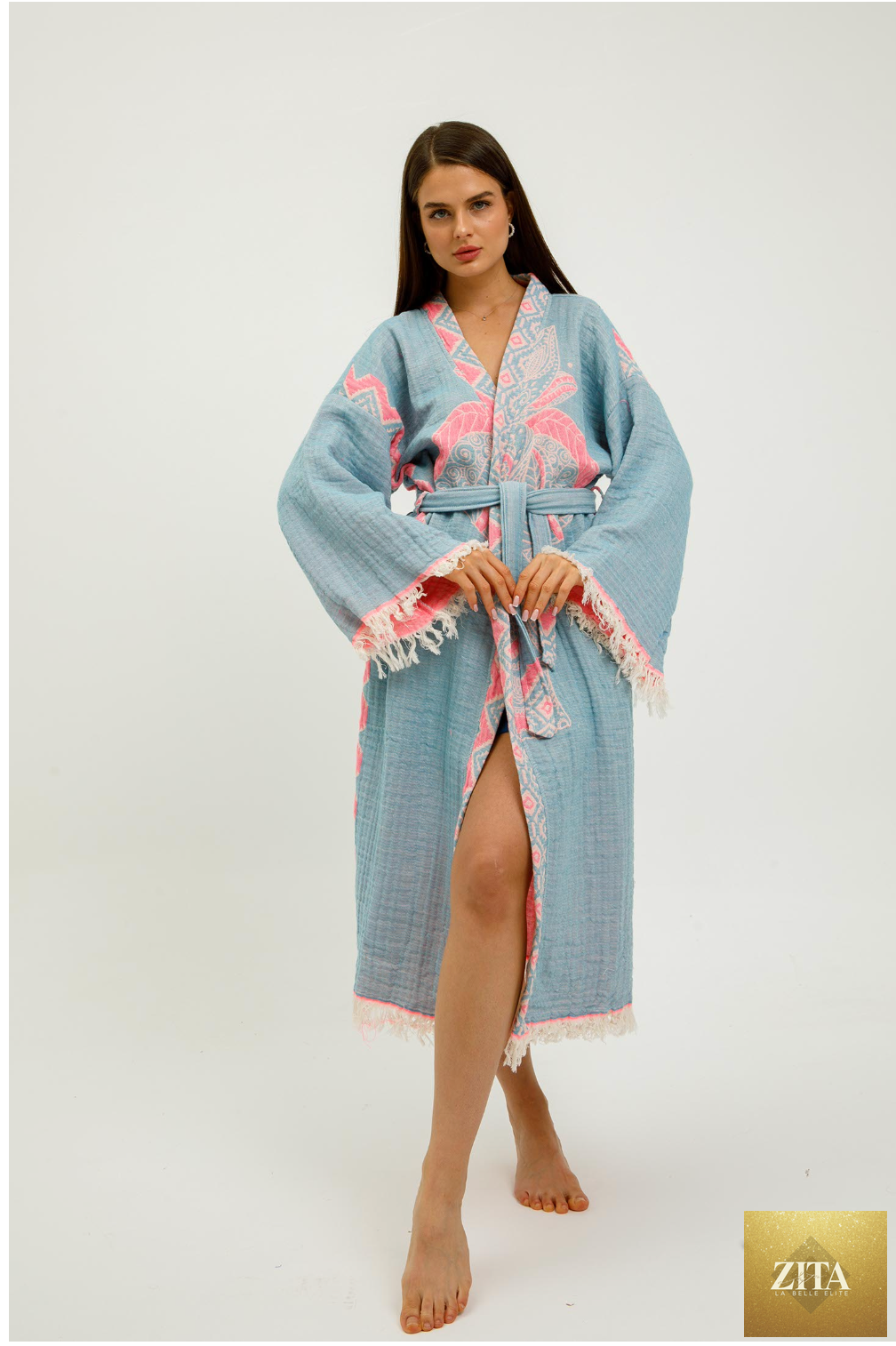 Pink jungle-themed kimono by Zita La Belle Elite featuring elephant print, flowing fabric, and intricate design details.