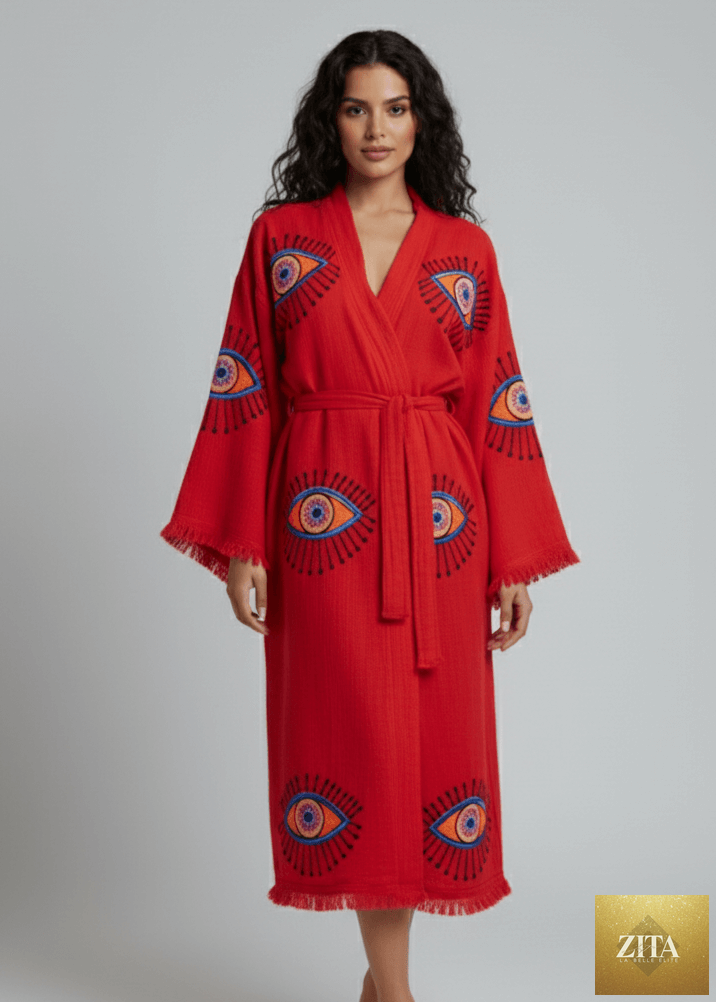 Hand-printed red evil eye kimono by Zita La Belle Elite, featuring traditional pattern and lightweight natural fabric.