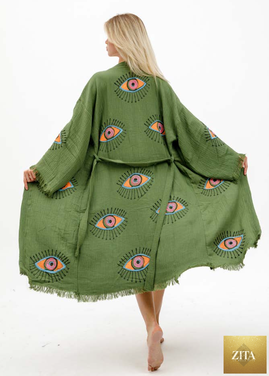 Natural black and green evil eye hand printed kimono by Zita La Belle Elite, featuring intricate pattern and flowing fabric.