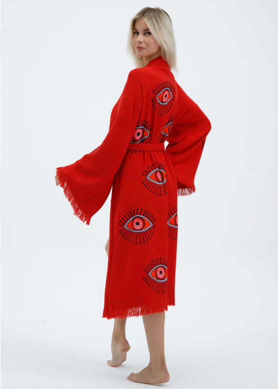 Hand-printed natural evil eye kimono by buldano featuring traditional design and flowing fabric style.