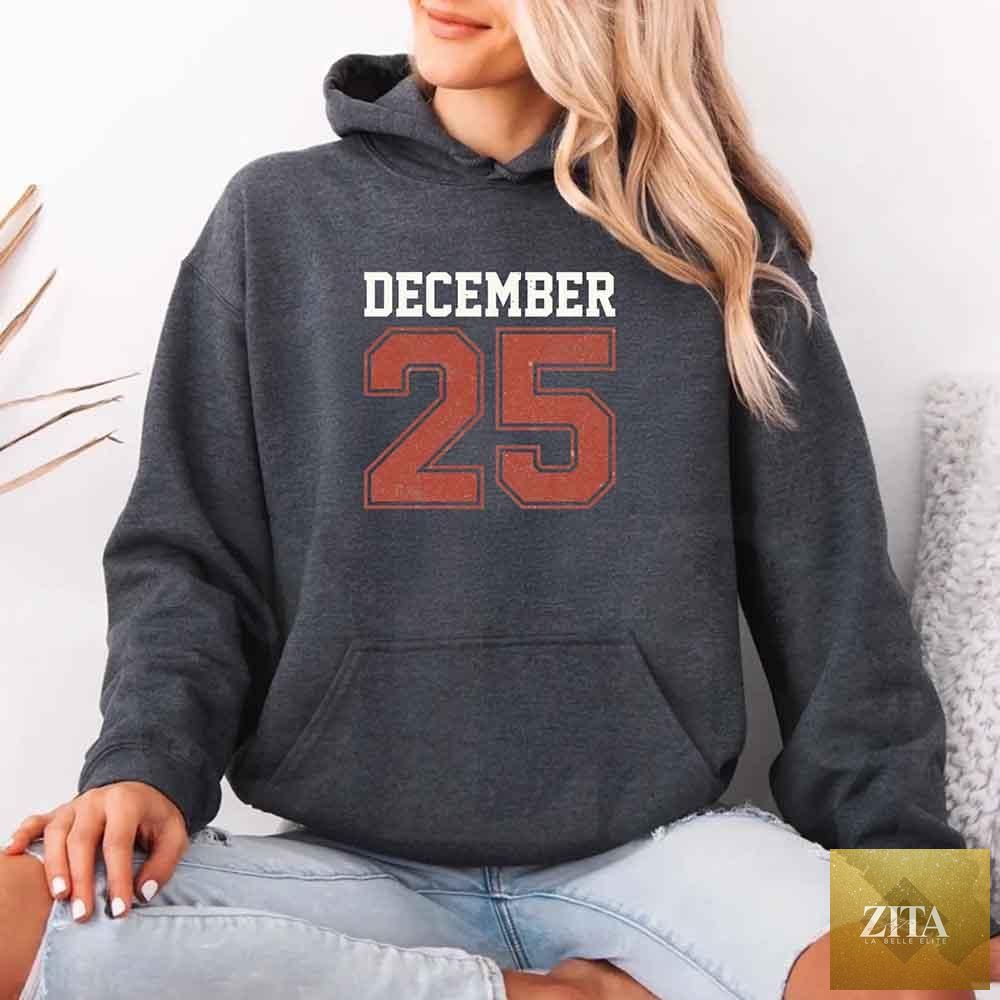 Retro Christmas hoodie by Adorb Custom Tees featuring December 25 festive holiday design, cozy winter apparel for the holidays.