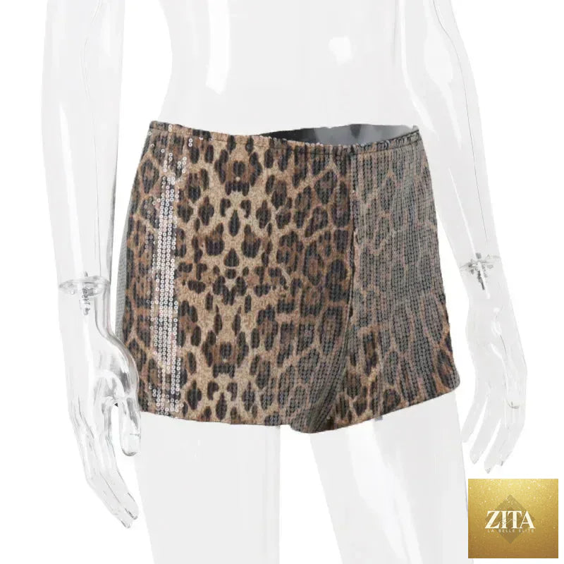 Femstylo retro leopard print shiny short leggings for women, stylish Y2K spring night club streetwear mini bottoms.