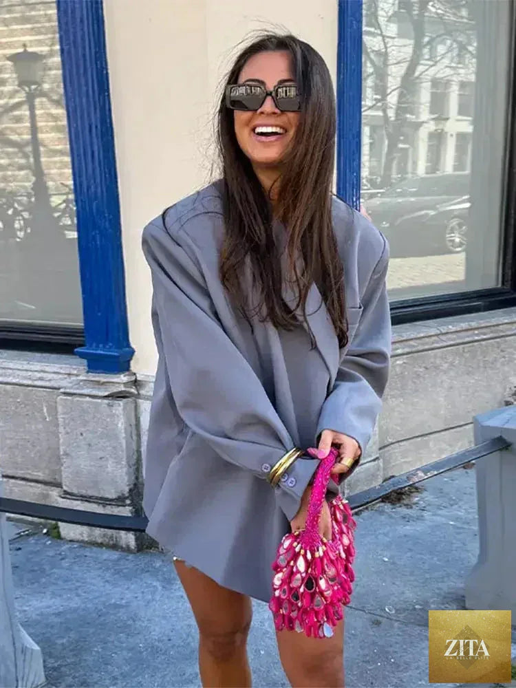 Women's Femstylo V-neck long sleeve suit jacket with side buttons, solid color, oversized fit, and pocket cuffs.