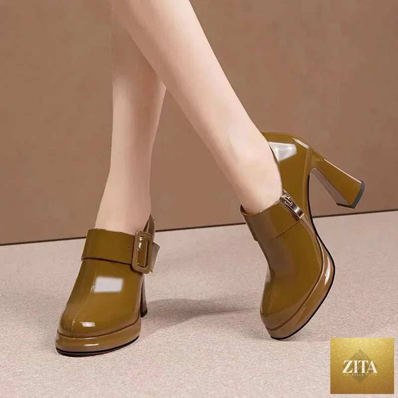 Black round head high heel women pump shoes by SMinvite, LLC with thick heel and classic design, suitable for formal and stylish wear.