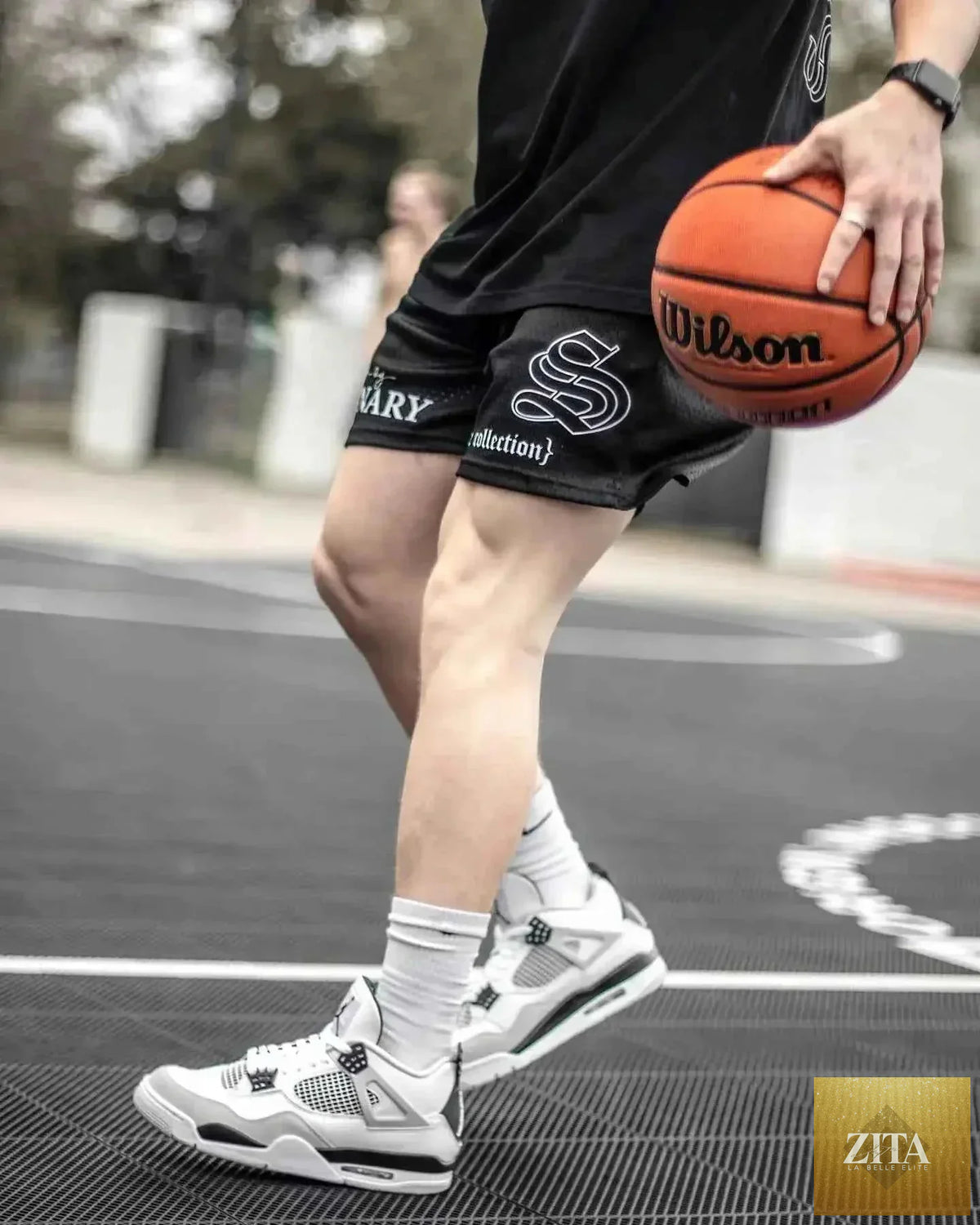 Zita La Belle Elite men's American style quick-dry basketball shorts in black with white accents, lightweight and breathable fabric.