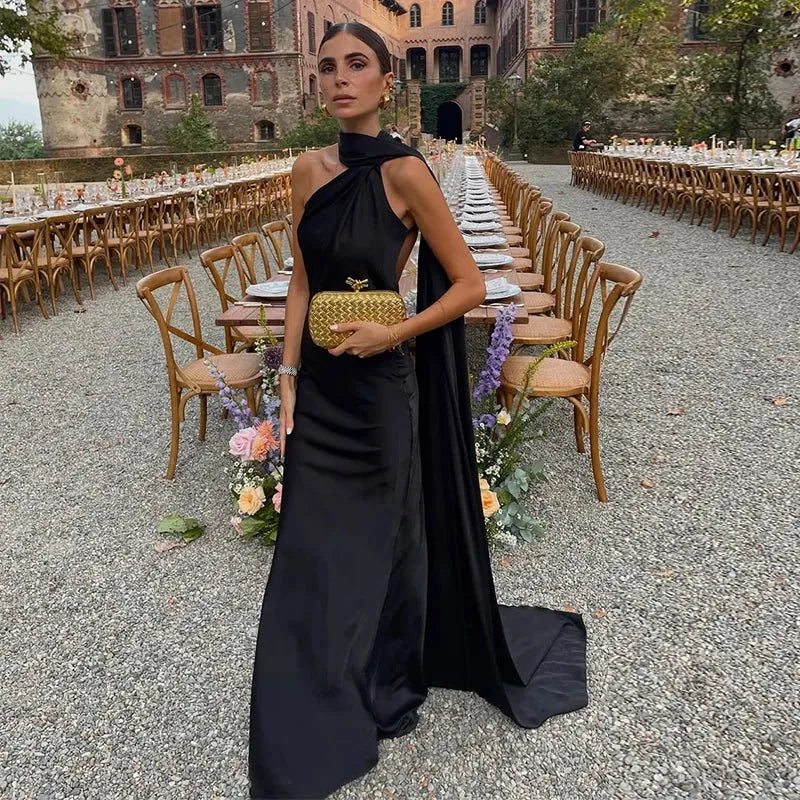 Femstylo backless lace-up maxi dress with ribbon straps, sleeveless evening gown perfect for parties, shown in elegant design.