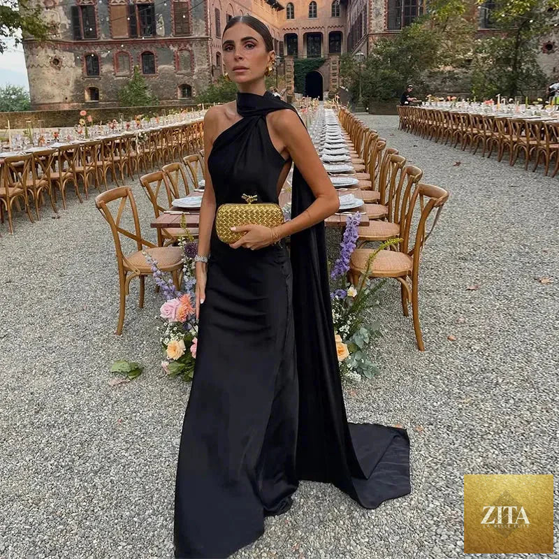 Femstylo backless lace-up maxi dress with ribbon straps, sleeveless evening gown perfect for parties, shown in elegant design.