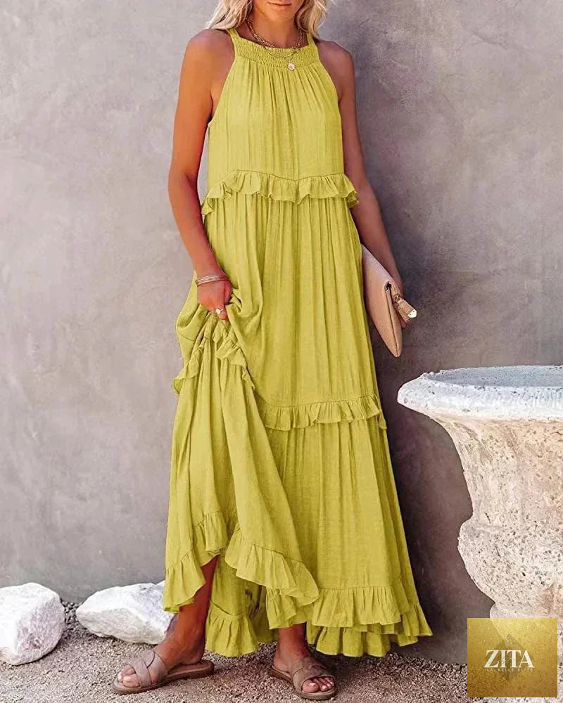 Elegant apricot ruffle maxi dress by Zita La Belle Elite, featuring flowing fabric and stylish ruffle details for casual wear.