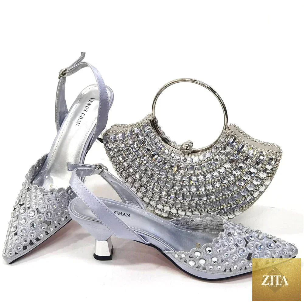 Elegant ladies shoes and matching bag set by EdleessFashion featuring a luxurious pattern and stylish design.