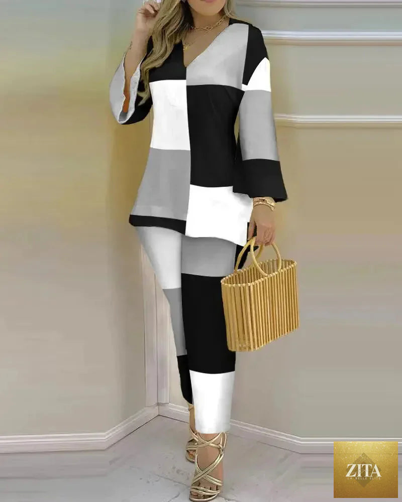Women’s long sleeve V-neck polyester two-piece set with printed design, stylish and comfortable for casual wear.