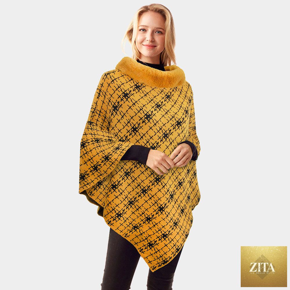 Mustard patterned faux fur collar poncho from Madeline Love, featuring a cozy, stylish design with a soft fur trim.