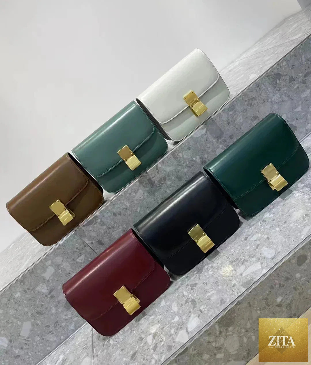 Women’s genuine small leather shoulder bag with adjustable strap and sleek design, crafted by SMinvite, LLC.