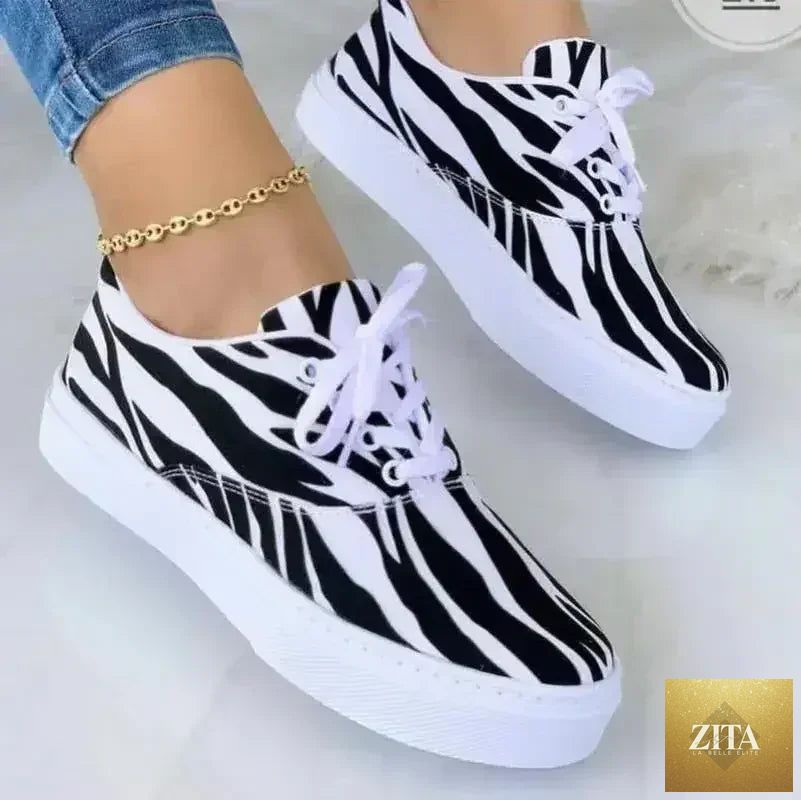 Femstylo 2022 graffiti women's urban sneakers with colorful graffiti design and white soles, casual footwear for street style.