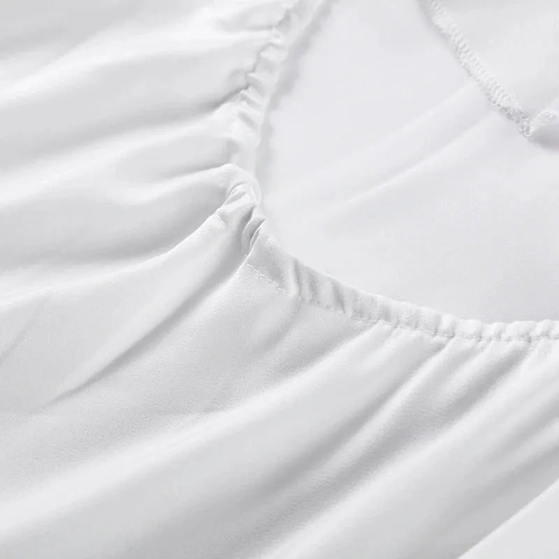 Backless lace-up maxi dress by Femstylo featuring a sleeveless design and ribbon accents, perfect for elegant evening events.