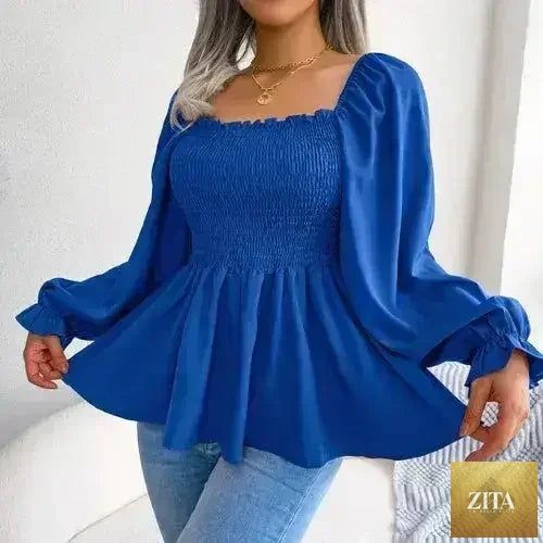 Femstylo loose fit chiffon blouse in elegant polyester, featuring a flowing design and lightweight fabric for stylish comfort.