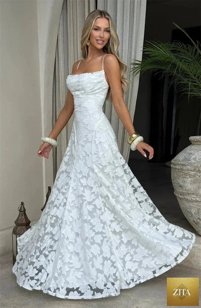 Femstylo women’s backless spaghetti strap maxi dress with lace-up neckline, off-shoulder, sleeveless evening gown for parties.