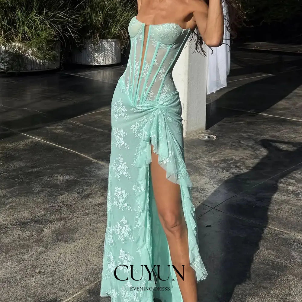 Elegant black lace prom dress by FLIPSTYLEZLLC featuring a high slit, corset back, long floor-length design, perfect for summer events.