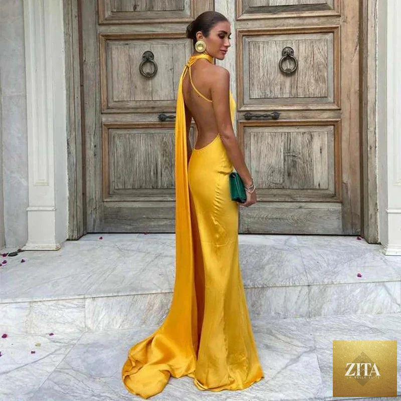 Femstylo backless lace-up maxi dress, sleeveless evening gown with ribbon details, perfect for formal parties and special occasions.