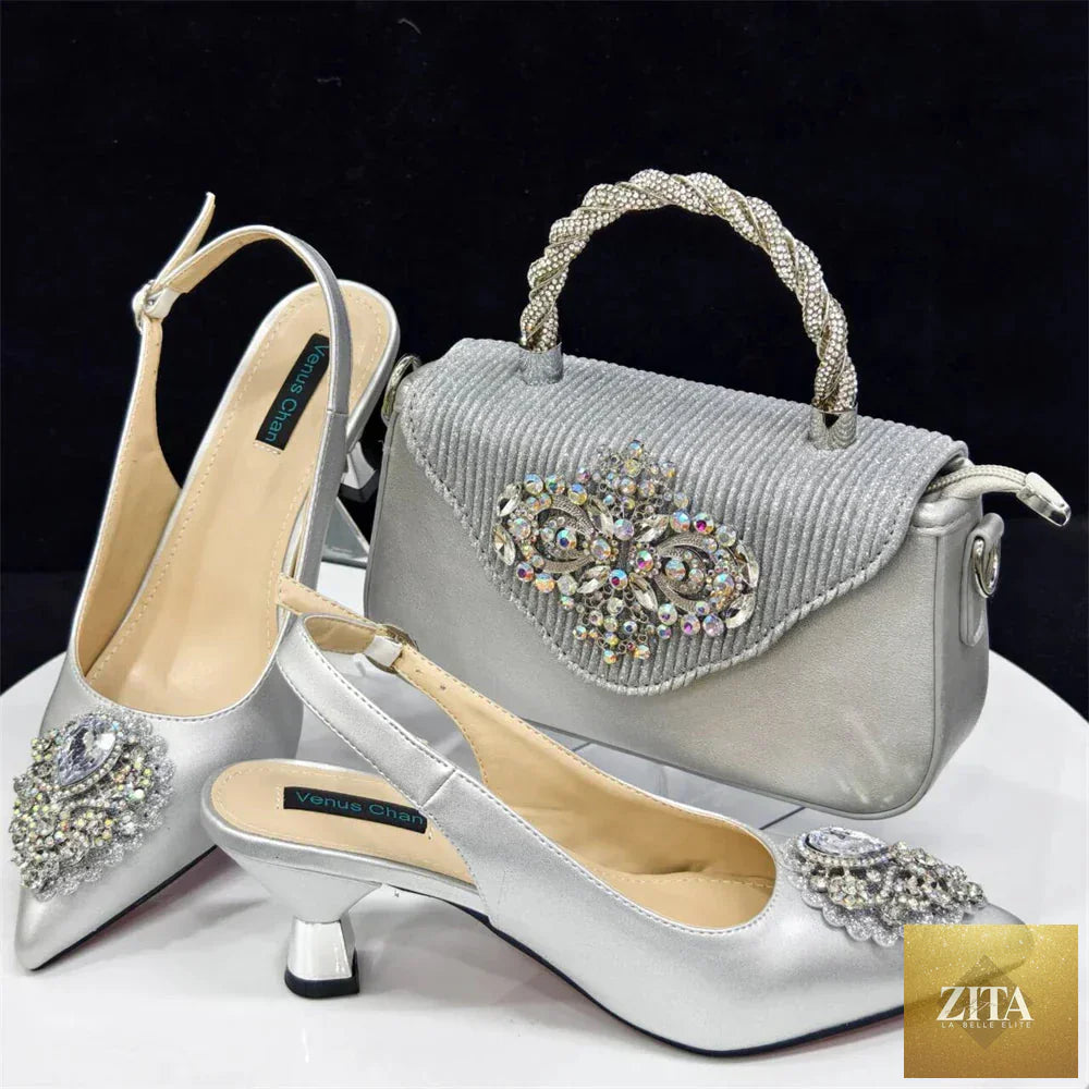 Luxurious women's crystal pointed high heels and matching shoe bag set by EdleessFashion showing elegant footwear and accessories.