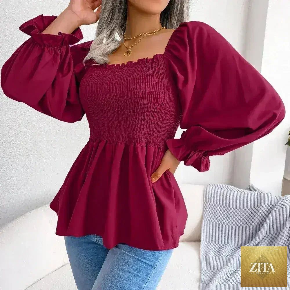 Femstylo loose fit chiffon blouse, elegant polyester top with flowy design, showcased on a hanger against a neutral background.