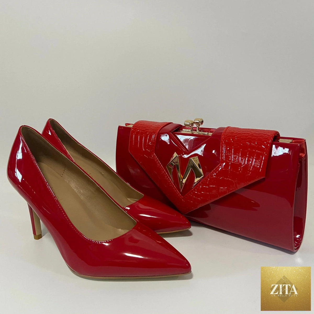 Elegant high heel shoes and matching bag by EdleessFashion, showcasing stylish accessories with sleek design and sophisticated details.
