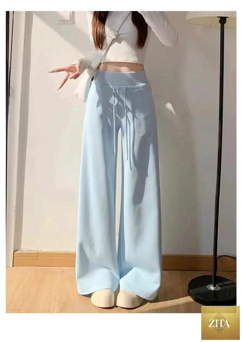 Gray high-waist loose wide-leg straight pants for women, casualwear by Zita La Belle Elite, shown on a model in a relaxed pose.