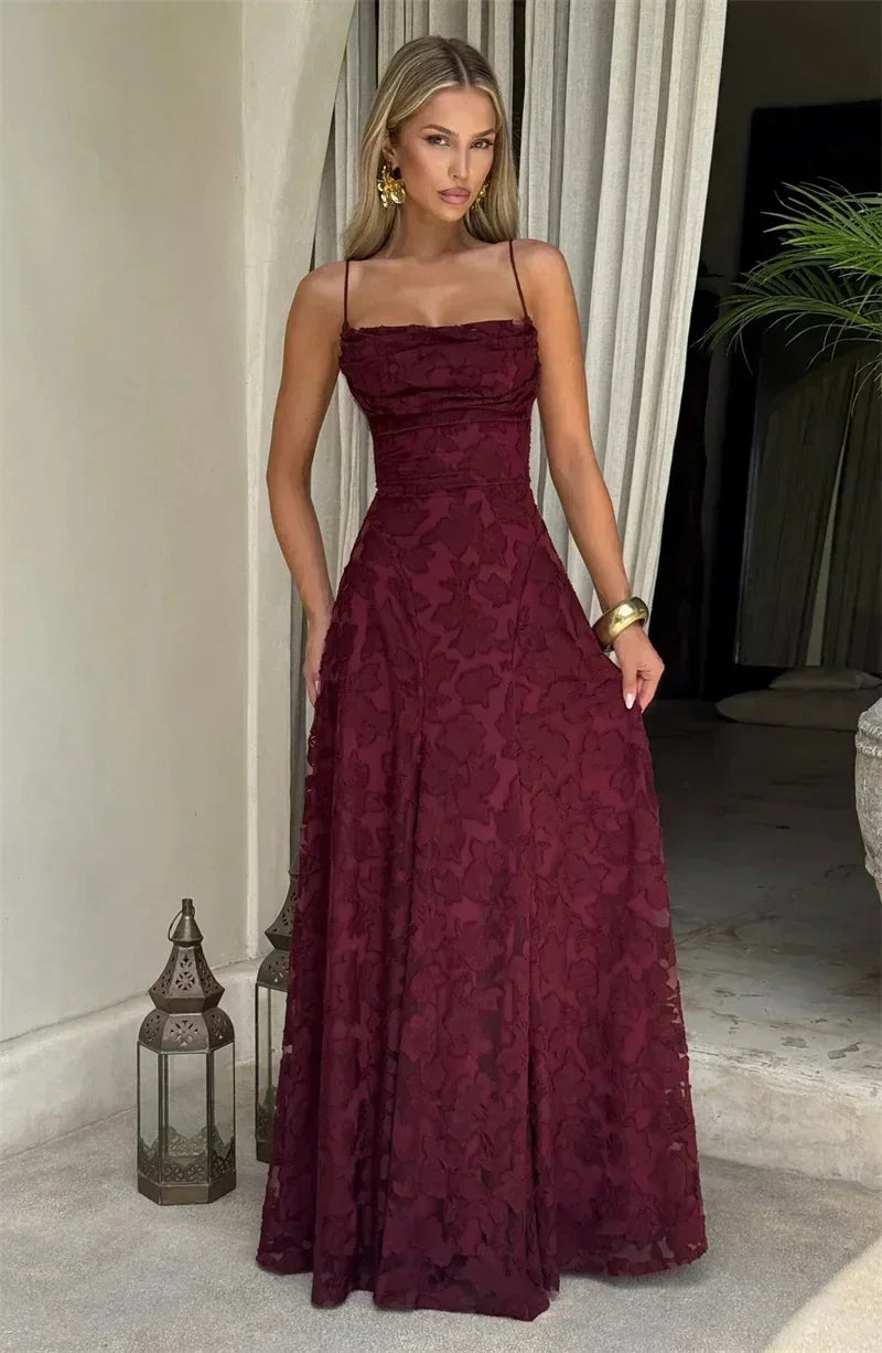 Femstylo women's backless spaghetti strap maxi dress with lace-up design, off-shoulder, sleeveless gown for evening or party wear.