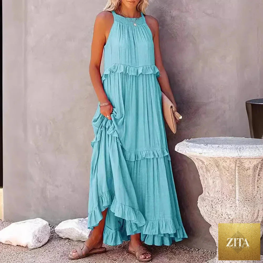 Elegant apricot ruffle maxi dress from Zita La Belle Elite, featuring flowing fabric and stylish casualwear design.